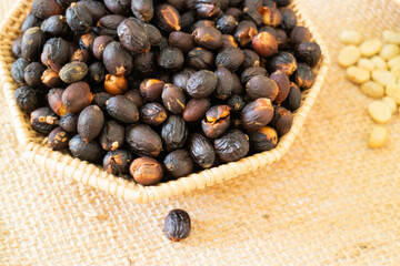 Coffee beans showing various stages of roasting from raw