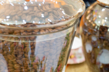 Coffee beans showing various stages of roasting from raw
