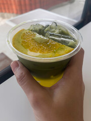 Pure matcha tea with orange juice healthy drink
