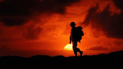 Silhouette of Veteran Walking into Sunrise for Peace and Reflection