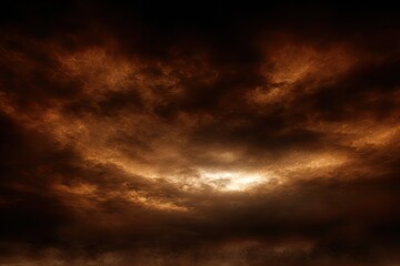 Fototapeta premium Fiery, ominous clouds; a dark sky with a luminous center