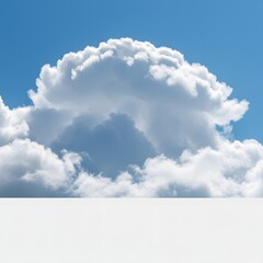 A majestic white cloud formation against a clear blue sky, viewed over a blank white platform creating a surreal, minimalist background.