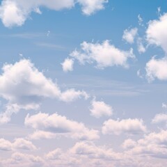 Fototapeta premium Ethereal skyscape featuring soft white cumulus clouds against a gentle blue and pastel pink sky background
