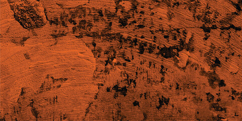 Abstract orange texture showing a rough grunge background for various design applications and creative projects