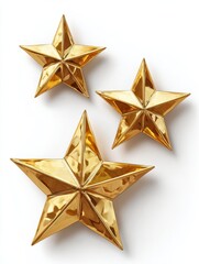 Obraz premium three shiny golden star shapes arranged creatively on a white background