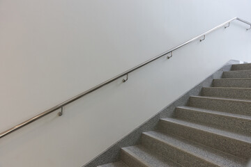stairway with stainless steel larder to the upstairs