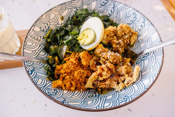 A tantalizing shot of a chicken teriyaki rice bowl, topped with a perfectly cooked egg. A vibrant...