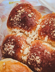 vertical photo of freshly baked homemade sweet buns