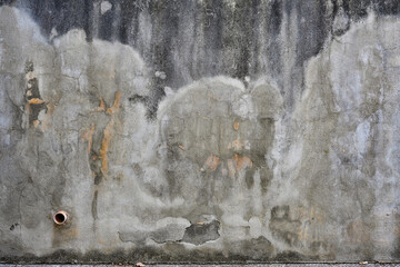 Dettaglio di parete ruvida con segni di deterioramento