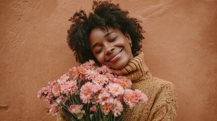 horizontal shot of pleased dark skinned woman stands with closed eyes and embraces big bouquet gets proposal from boyfriend pretty girlfriend in casual turtleneck enjoys odor of nice flowers no logos