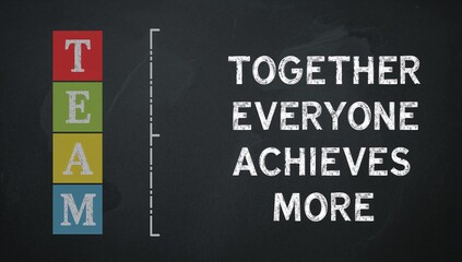 Teamwork makes the dream work with stacked blocks spelling team