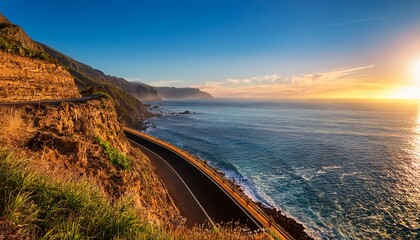 picturesque coastal highway winding along cliffs overlooking the azure ocean at sunrise