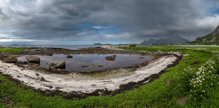 Red Rorbuer Hut Near Rambergstranda White Sand Beach At Ramberg On Lofoten Islands In Norway