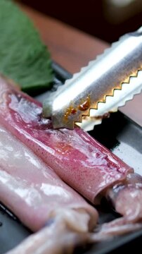 Fresh raw squid of fresh squid display at Mutrah fish Market, Muscat, Oman video footage.