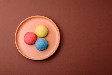 Japanese mochi, ice cream or Asian sweets with fruit filling. Mochi of different colors