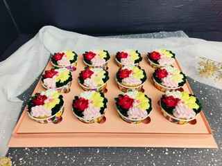 cupcake with colorful flower-shaped butter cream