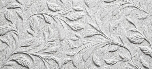 White embossed wallpaper with repeating leaf and vine design
