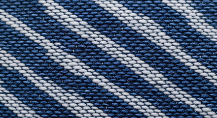Textile pattern of blue and white diagonal stripes in close detail