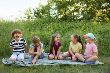 Fototapeta premium Children spending time in nature on summer day
