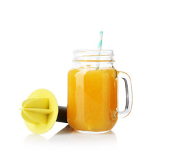 Tasty orange juice in mason jar and plastic juicer isolated white