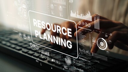 Business Professional Engaged in Resource Planning with Digital Data Interface Overlay on Computer Keyboard in Modern Office Environment. Asymptotic smart data analytic.