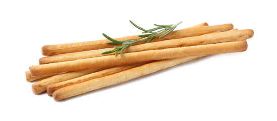 Delicious grissini sticks with rosemary isolated on white
