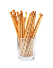 Delicious grissini sticks in glass isolated on white