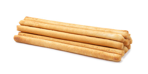 Many delicious grissini sticks isolated on white