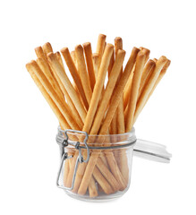 Delicious grissini sticks in jar isolated on white