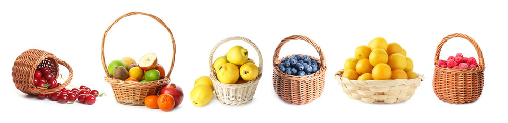 Fresh fruits and berries in wicker baskets isolated on white, set