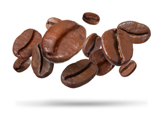 Roasted coffee beans falling against white background