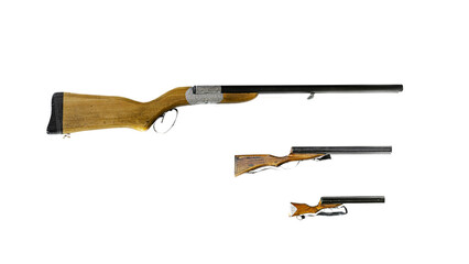 Old traditional black powder rifle Three decorative shotguns with black metal barrels, wooden combs and grips decorated with engravures on a silver colored metallic band. Isolated in transparent backg