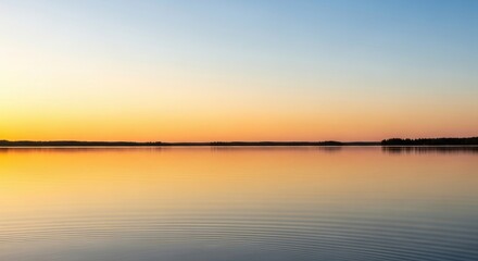 Naklejka premium Serene Lake Sunset: Tranquil Waters Reflecting Golden Sky, Peaceful Landscape.