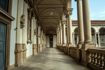 Corridor of the inner courtyard of the Pinacoteca di Brera in Milan, Italy