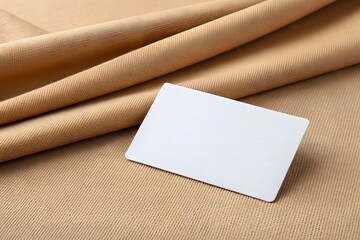 Blank White Card on Textured Beige Fabric blank card mockup