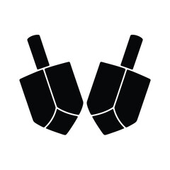 Two black dreidels on a white background for hanukkah