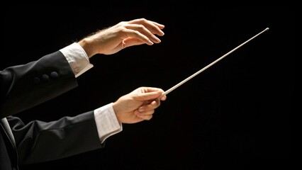 Conductor's hands gesture against a dark background with baton in right hand