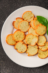 Crisps croutons with greens croutons delicious snack fresh delicious gourmet food background on the table  rustic food top view copy space