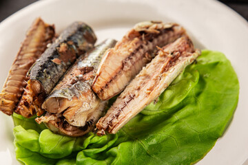 Sardine canned food sprats fish seafood fresh pescetarian diet gourmet food background on the table rustic food top view copy space keto and paleo diet