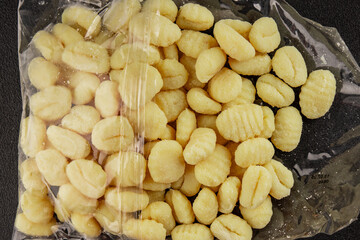 Gnocchi raw potato dough snack fresh delicious gourmet food background on the table  rustic food top view copy space vegetarian food