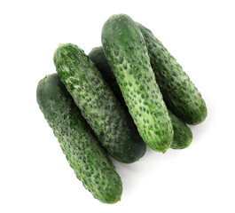 Many fresh green cucumbers isolated on white, top view