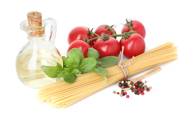Raw spaghetti pasta and different ingredients isolated on white
