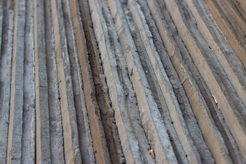 Textured Concrete Slabs for Wall Cladding with Unique Imperfections and Grey Tones offering a Rustic Look ideal as Construction Material or Design Element for Modern Architecture