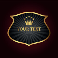 Naklejka premium A decorative shield with a gold border and a crown at the top. The background of the shield has a radiant effect, and in the center is written “YOUR TEXT” in large letters.