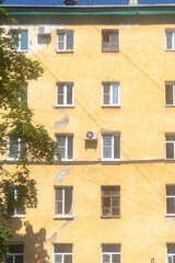Air conditioners are installed on the facade of the building. device for comfortable living in hot weather, room cooling. air cooling in the heat, air conditioning.