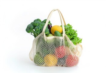Reusable shopping bag filled with fresh groceries isolated on white