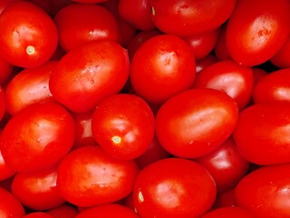Set of red pear tomatoes. Background of healthy food.