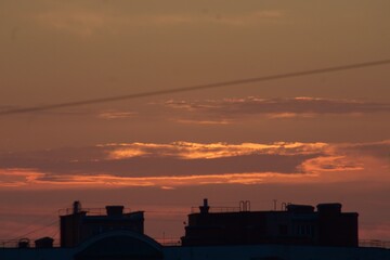 Naklejka premium sunset over the city