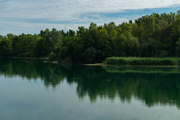Fototapeta premium Calm Countryside Lake in Forest