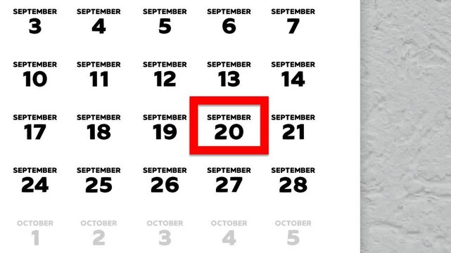 The date September 20th marked with a red cursor on the wall calendar 2025